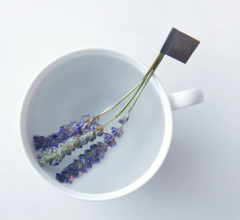 Kkokodam Tea Stick Korean Mint in teacup brewing.